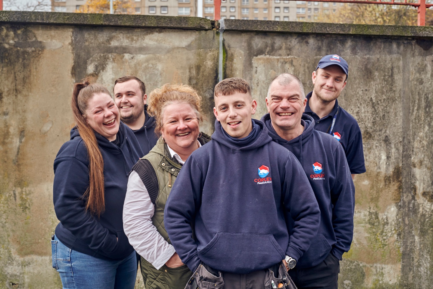Team of Copley Pest Solutions instant cash loans UK staff wearing branded jumpers